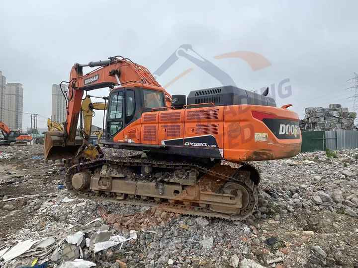 Perfect performance Used Doosan excavator DX520LC-9C in good condition for sale - Pelle sur chenille: photos 2 Perfect performance Used Doosan excavator DX520LC-9C in good condition for sale - Pelle sur chenille: photos 2