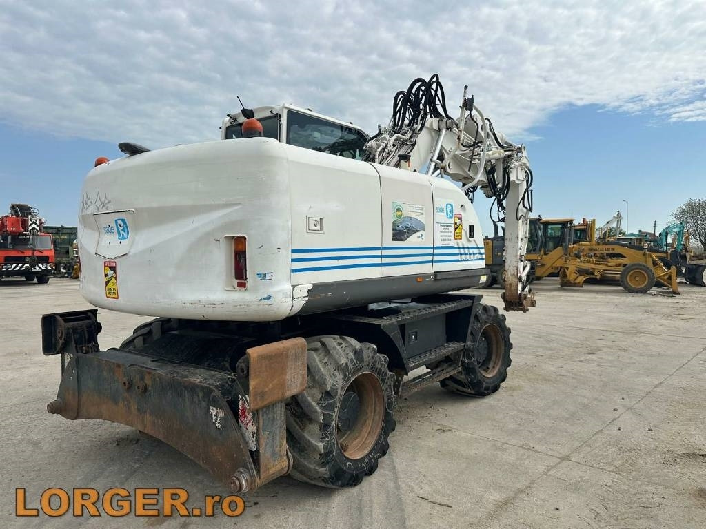 Hitachi ZX 140 W-3 - Pelle sur pneus: photos 3 Hitachi ZX 140 W-3 - Pelle sur pneus: photos 3
