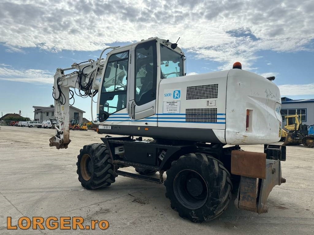 Hitachi ZX 140 W-3 - Pelle sur pneus: photos 5 Hitachi ZX 140 W-3 - Pelle sur pneus: photos 5