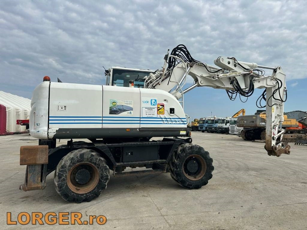 Hitachi ZX 140 W-3 - Pelle sur pneus: photos 2 Hitachi ZX 140 W-3 - Pelle sur pneus: photos 2