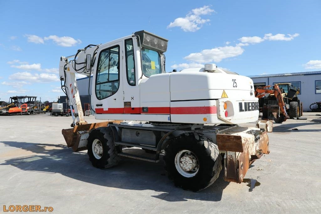 Liebherr A 314 - Pelle sur pneus: photos 2 Liebherr A 314 - Pelle sur pneus: photos 2