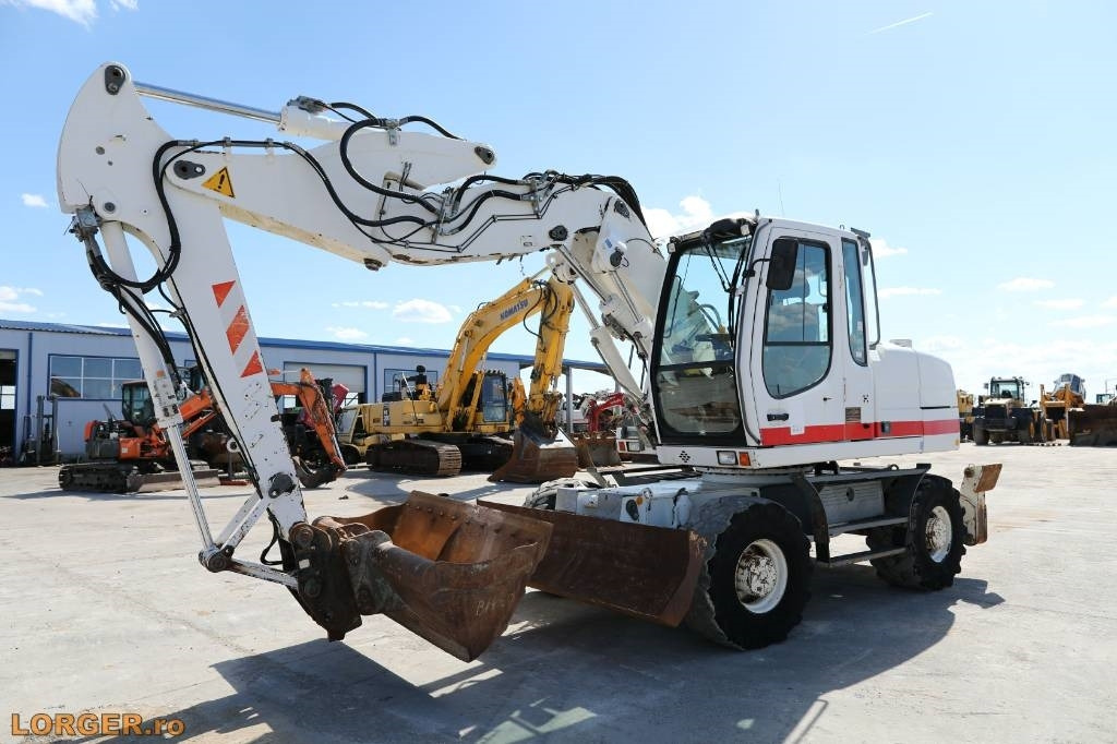 Liebherr A 314 - Pelle sur pneus: photos 1 Liebherr A 314 - Pelle sur pneus: photos 1