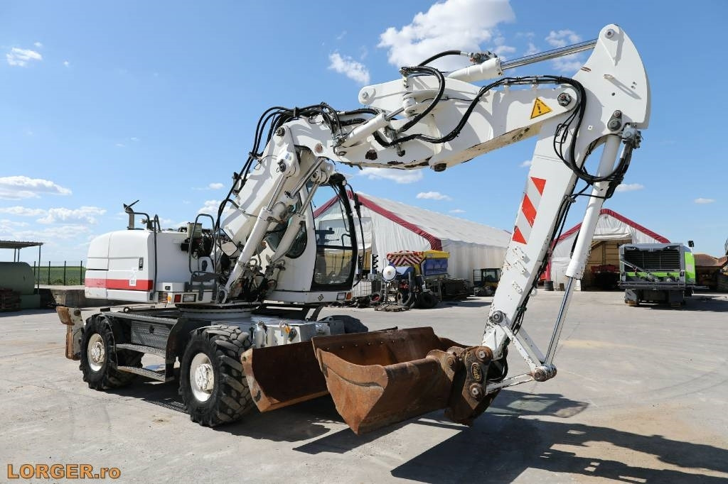 Liebherr A 314 - Pelle sur pneus: photos 4 Liebherr A 314 - Pelle sur pneus: photos 4