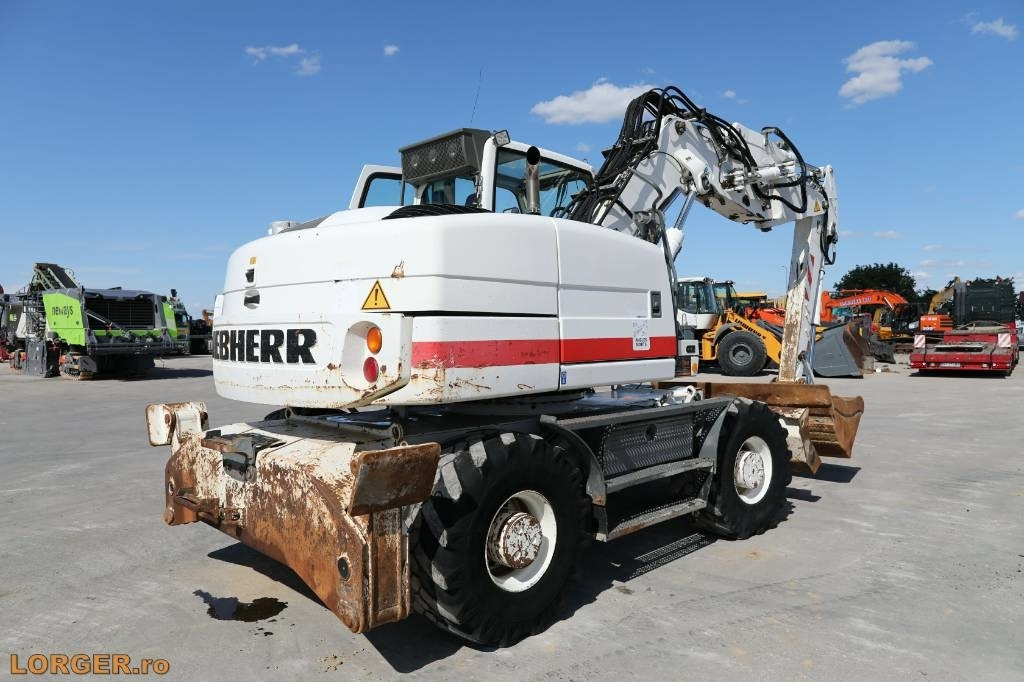Liebherr A 314 - Pelle sur pneus: photos 3 Liebherr A 314 - Pelle sur pneus: photos 3