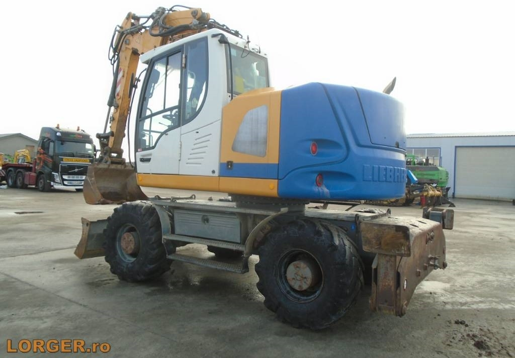 Liebherr A 914 Compact - Pelle sur pneus: photos 2 Liebherr A 914 Compact - Pelle sur pneus: photos 2