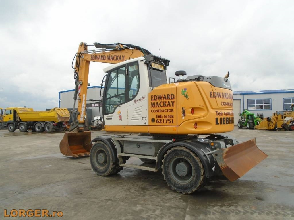 Liebherr A 914 - Pelle sur pneus: photos 3 Liebherr A 914 - Pelle sur pneus: photos 3