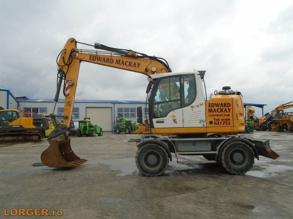 Liebherr A 914 - Pelle sur pneus: photos 2 Liebherr A 914 - Pelle sur pneus: photos 2