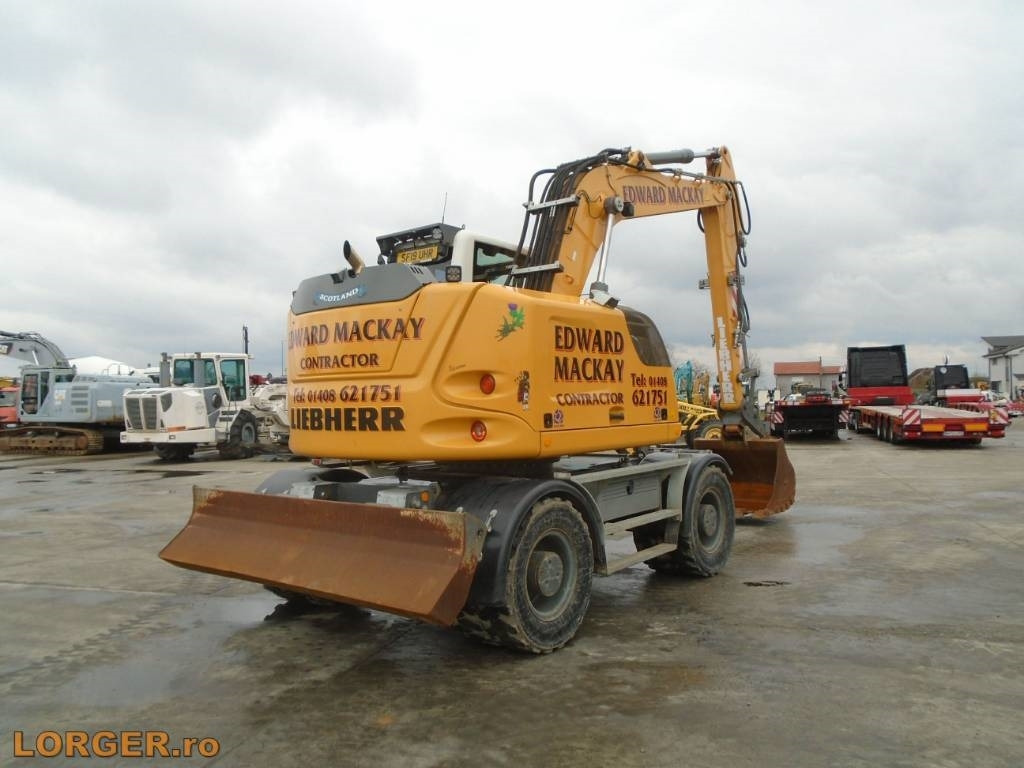Liebherr A 914 - Pelle sur pneus: photos 4 Liebherr A 914 - Pelle sur pneus: photos 4
