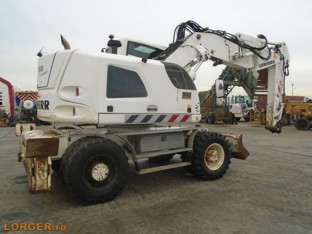 Liebherr A 918 Compact - Pelle sur pneus: photos 3 Liebherr A 918 Compact - Pelle sur pneus: photos 3
