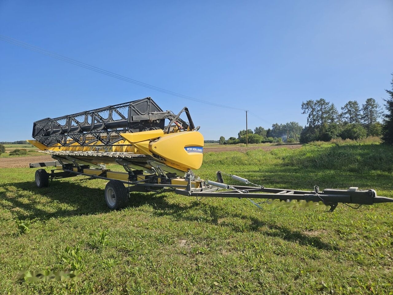 New Holland CX 6.90 - Moissonneuse-batteuse: photos 4 New Holland CX 6.90 - Moissonneuse-batteuse: photos 4