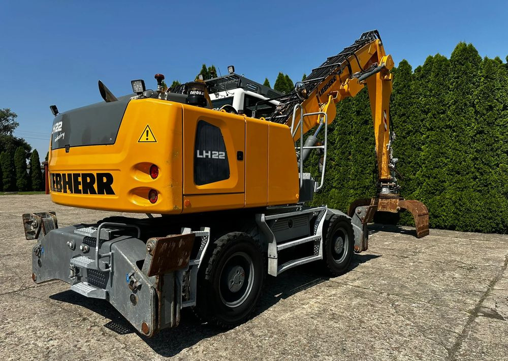 Liebherr LH22 M - Pelle sur pneus: photos 1 Liebherr LH22 M - Pelle sur pneus: photos 1