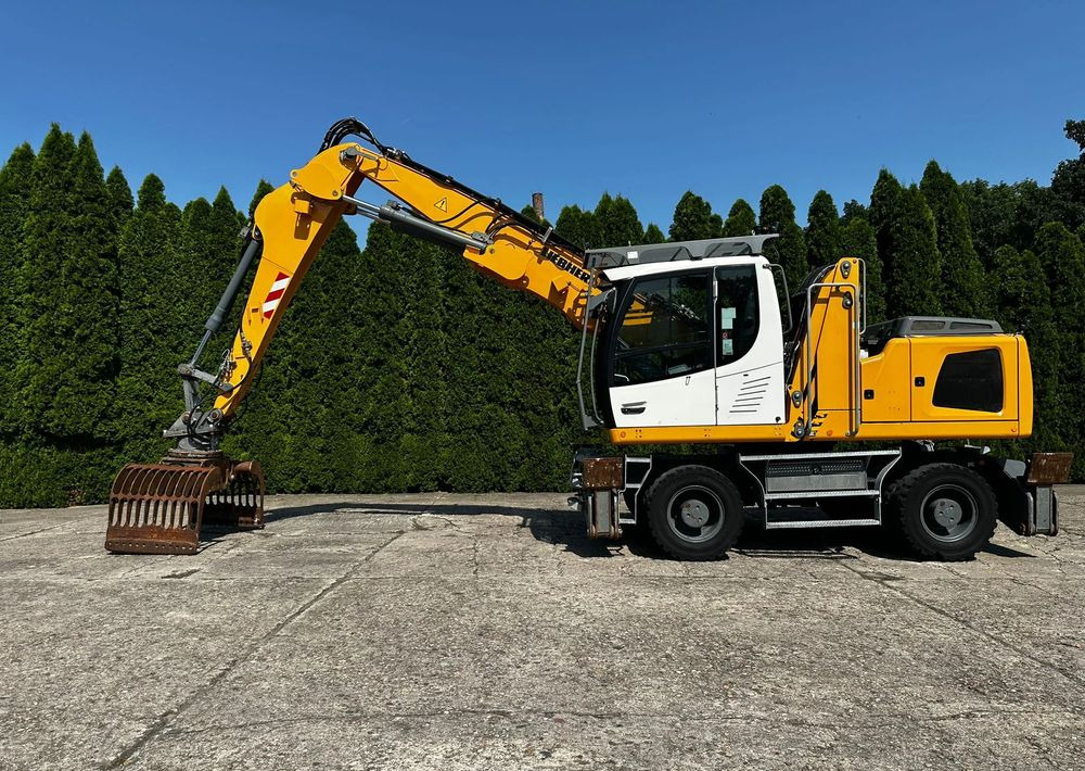 Liebherr LH22 M - Pelle sur pneus: photos 5 Liebherr LH22 M - Pelle sur pneus: photos 5