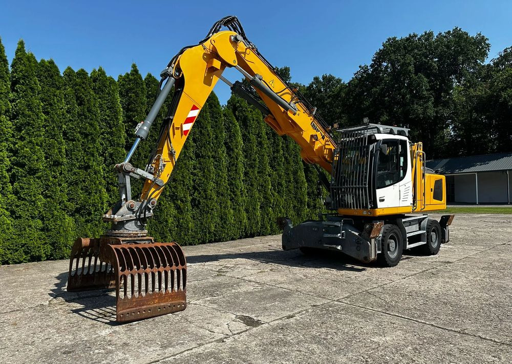 Liebherr LH22 M - Pelle sur pneus: photos 4 Liebherr LH22 M - Pelle sur pneus: photos 4