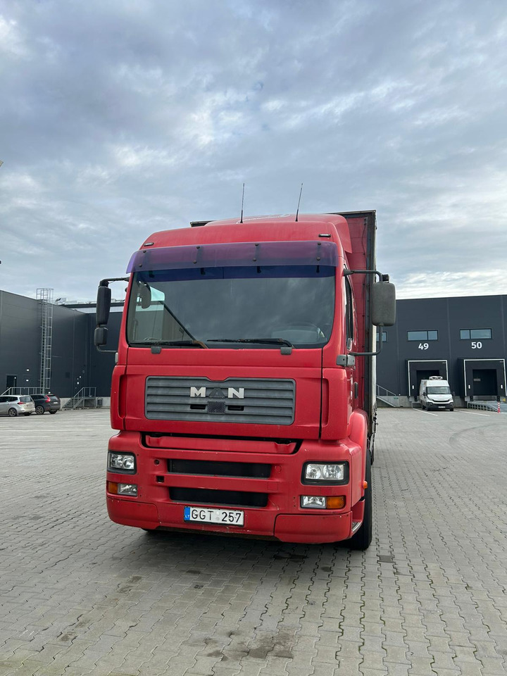 MAN TGA 18.310 - Camion à rideaux coulissants: photos 1 MAN TGA 18.310 - Camion à rideaux coulissants: photos 1