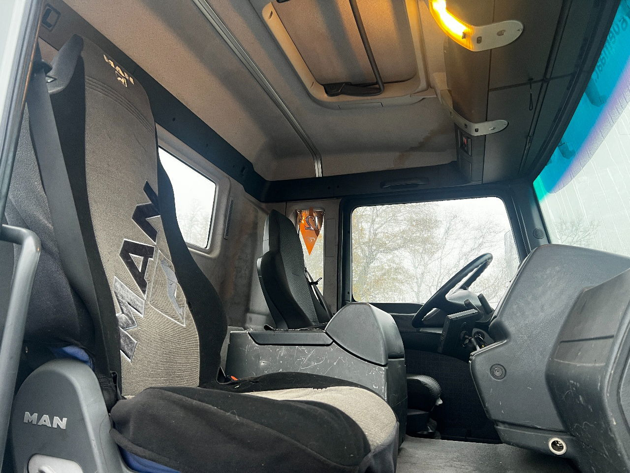 Camion grue MAN TGA 18.310 met Palfinger PK12000 kraan: photos 13 Camion grue MAN TGA 18.310 met Palfinger PK12000 kraan: photos 13