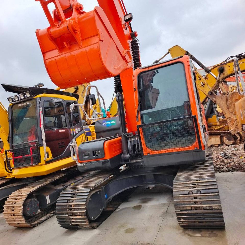Doosan DX 150 LC - Pelle sur chenille: photos 1 Doosan DX 150 LC - Pelle sur chenille: photos 1