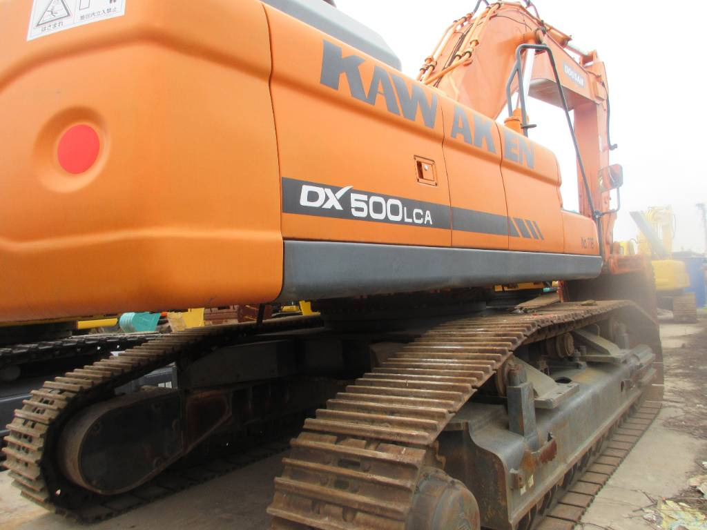 Doosan DX 500 LCA - Pelle sur chenille: photos 2 Doosan DX 500 LCA - Pelle sur chenille: photos 2