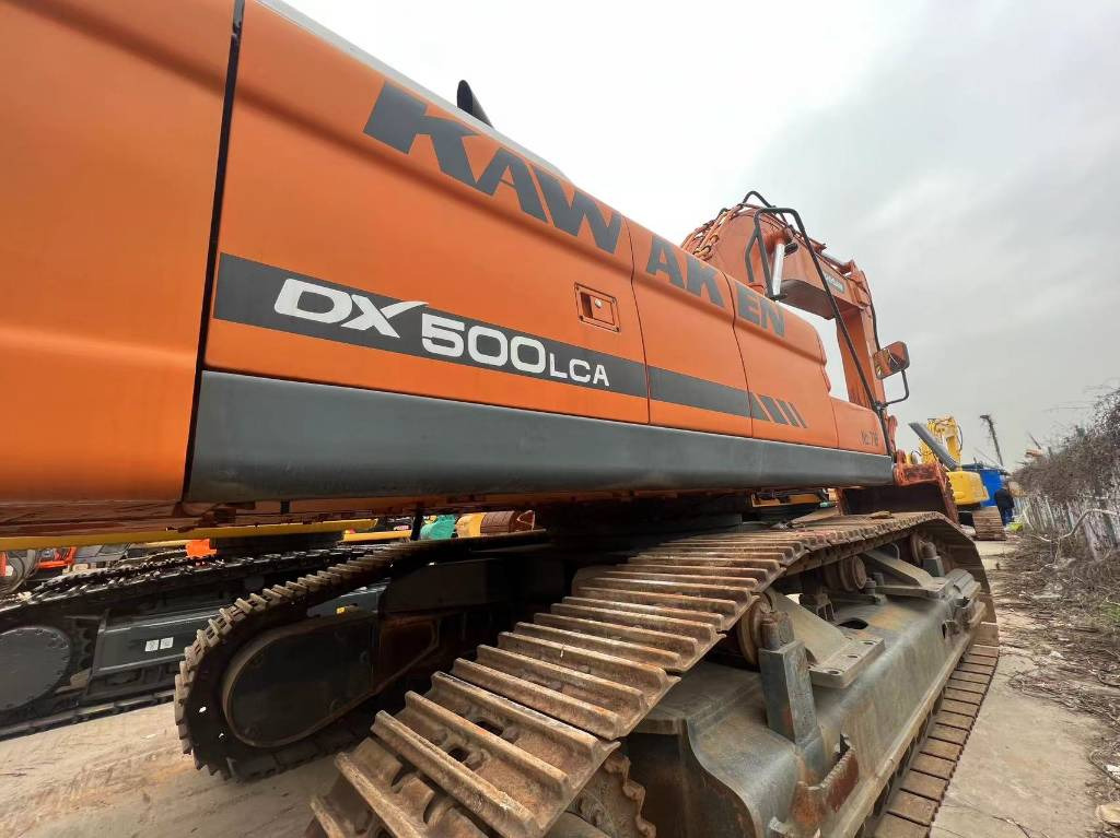 Doosan DX 500 LCA - Pelle sur chenille: photos 1 Doosan DX 500 LCA - Pelle sur chenille: photos 1