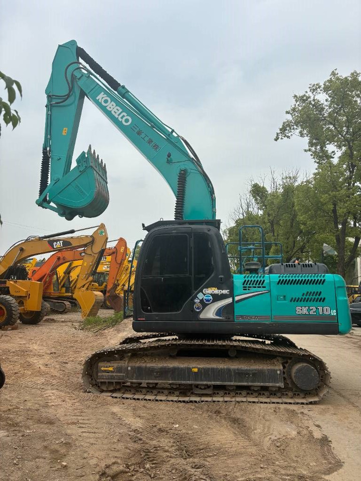 Kobelco SK 210 - Pelle sur chenille: photos 1 Kobelco SK 210 - Pelle sur chenille: photos 1