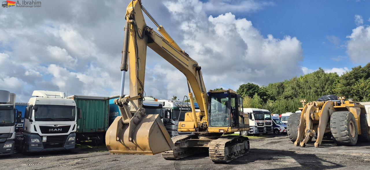 Komatsu PC 210 Hammerhydraulik | Klima UVV 12 25 - Pelle sur chenille: photos 1 Komatsu PC 210 Hammerhydraulik | Klima UVV 12 25 - Pelle sur chenille: photos 1