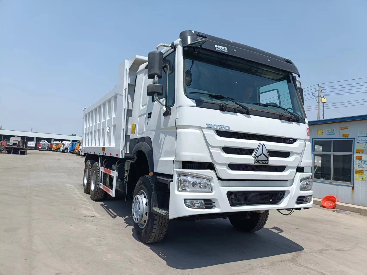 HOWO 371 6X4 - Camion benne: photos 1 HOWO 371 6X4 - Camion benne: photos 1