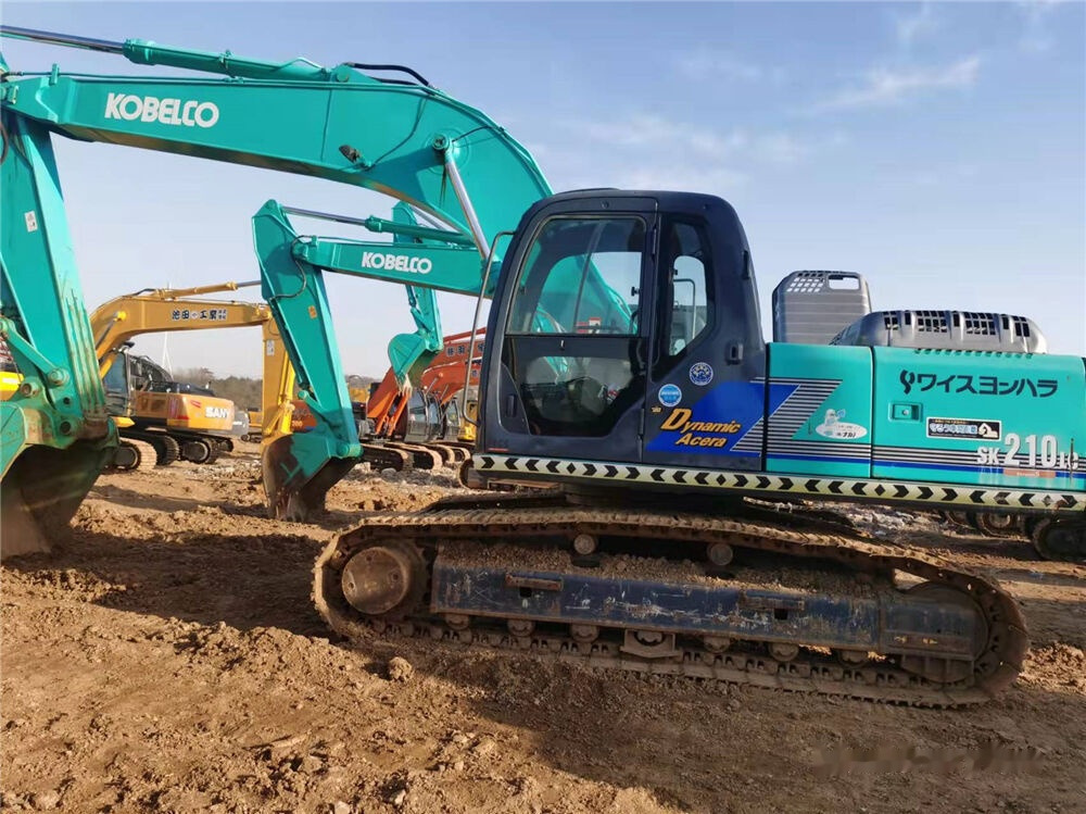 Kobelco SK210LC - Pelle sur chenille: photos 5 Kobelco SK210LC - Pelle sur chenille: photos 5