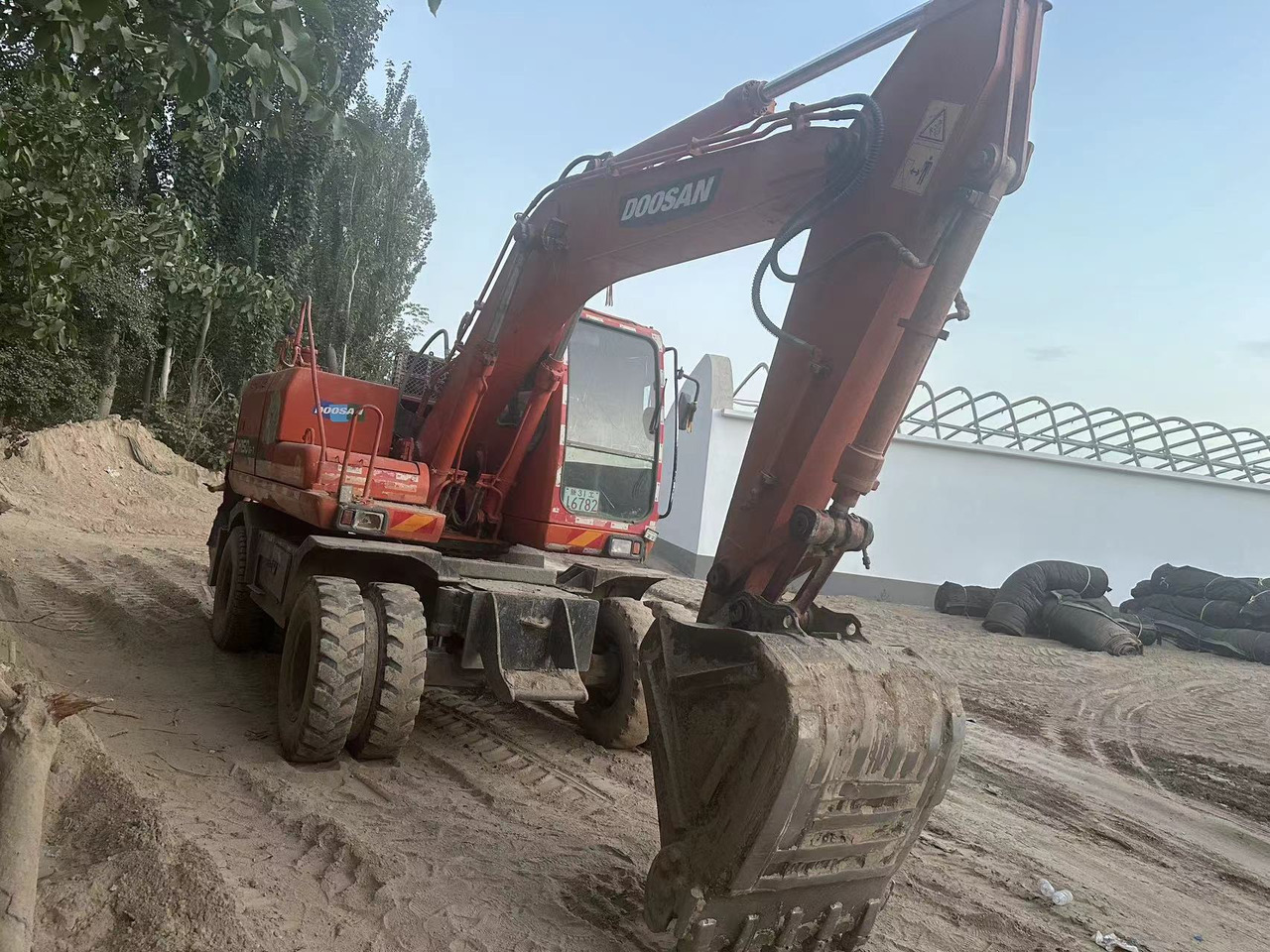 DOOSAN DH150W-7 - Pelle sur pneus: photos 4 DOOSAN DH150W-7 - Pelle sur pneus: photos 4