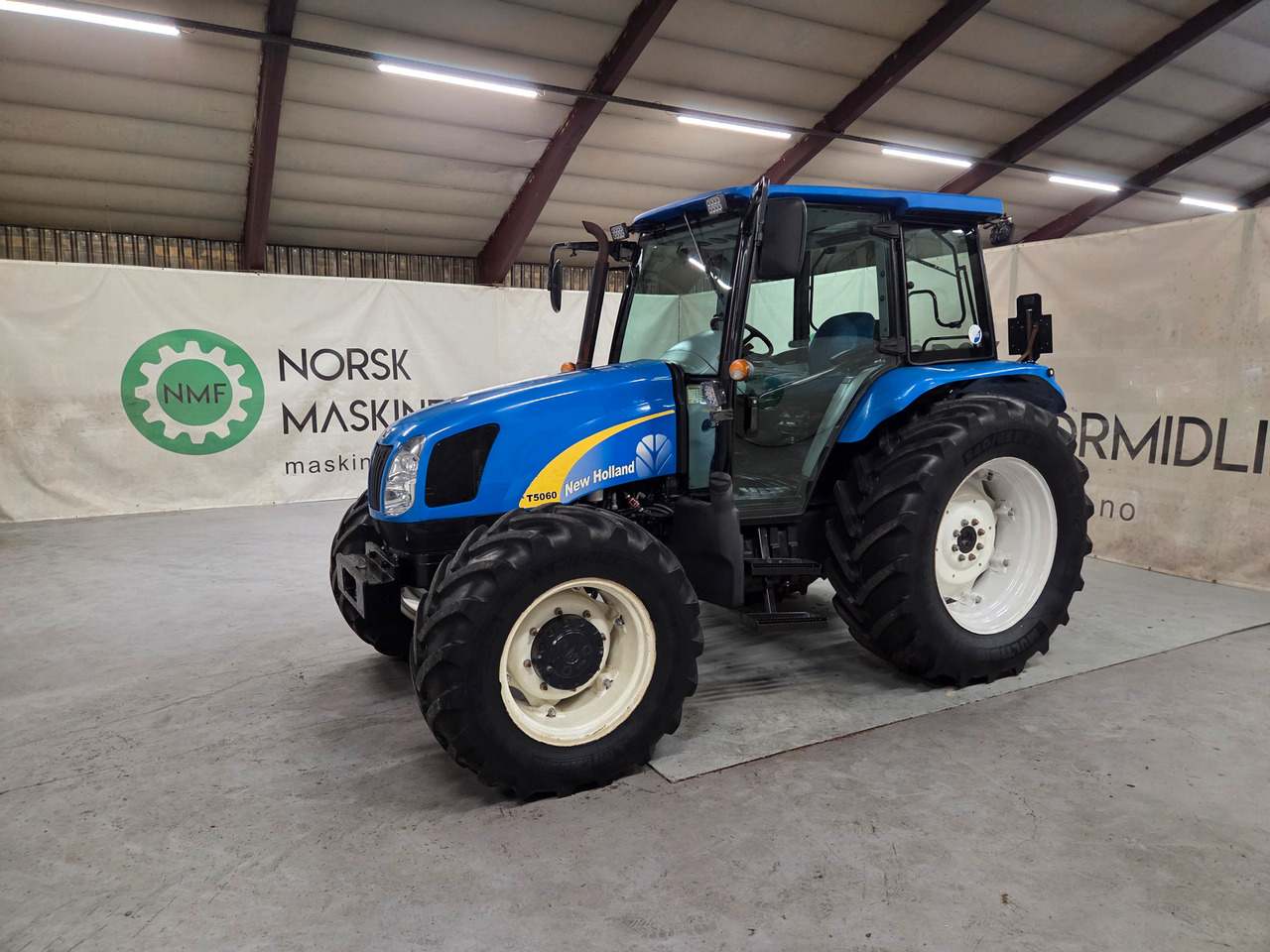 New Holland T5060 #Fin 1 eiers traktor - Tracteur agricole: photos 1 New Holland T5060 #Fin 1 eiers traktor - Tracteur agricole: photos 1
