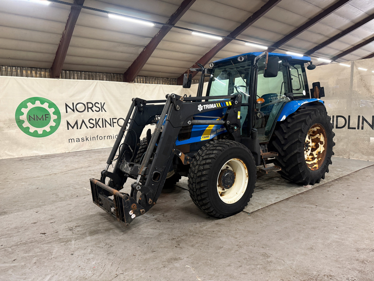 New Holland T5060 - Tracteur agricole: photos 1 New Holland T5060 - Tracteur agricole: photos 1