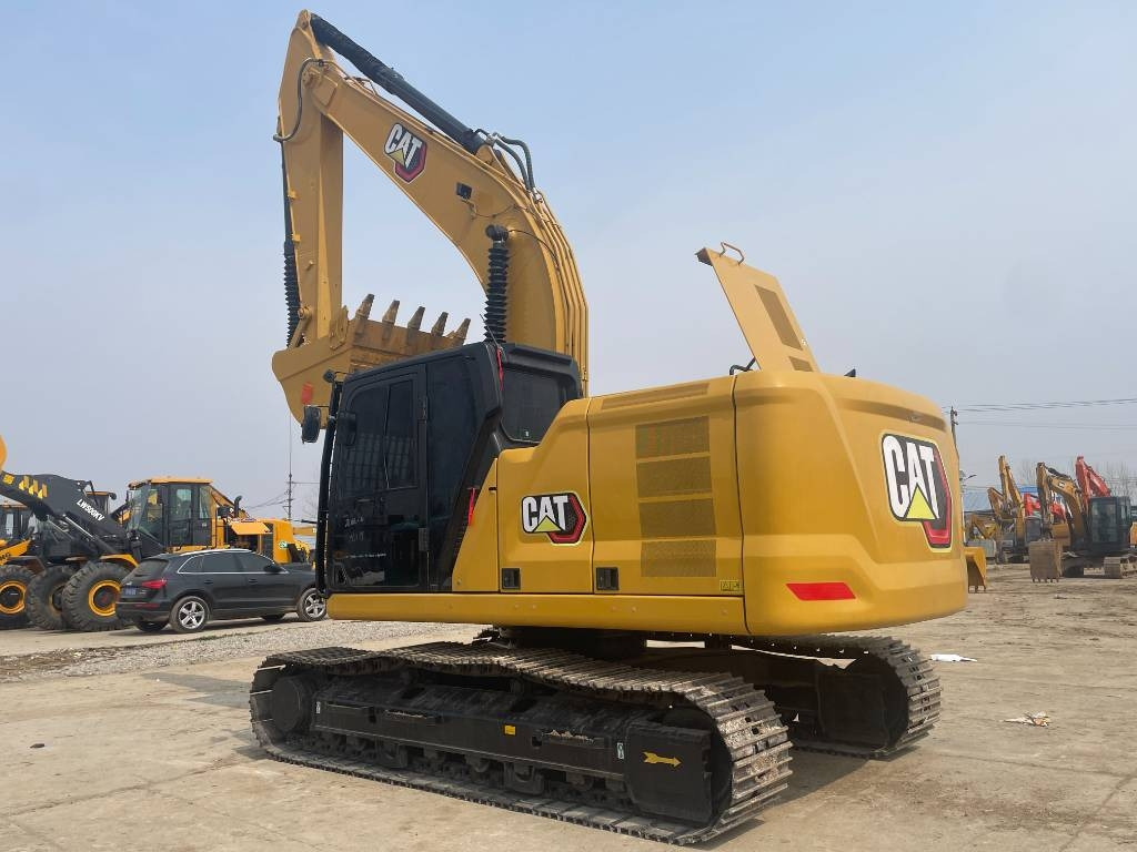 CAT 323GC - Pelle sur chenille: photos 1 CAT 323GC - Pelle sur chenille: photos 1
