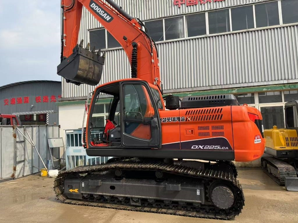 Doosan DX 225 LCA - Pelle sur chenille: photos 1 Doosan DX 225 LCA - Pelle sur chenille: photos 1