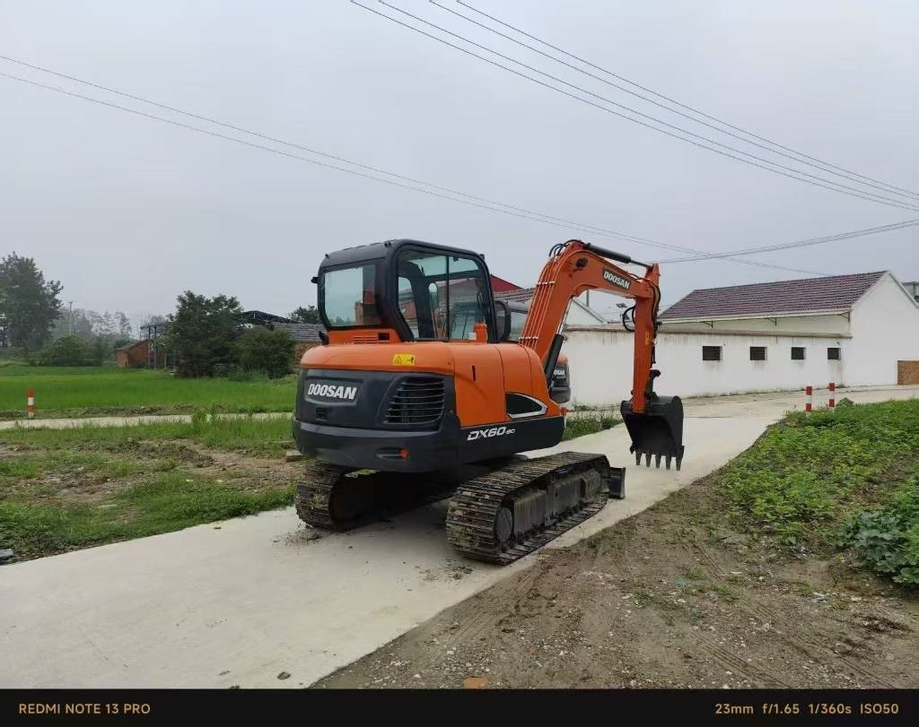 Doosan DX 60 - Mini pelle: photos 1 Doosan DX 60 - Mini pelle: photos 1