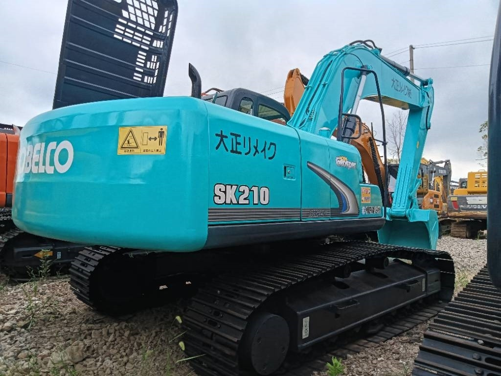 Kobelco SK 210 - Pelle sur chenille: photos 1 Kobelco SK 210 - Pelle sur chenille: photos 1