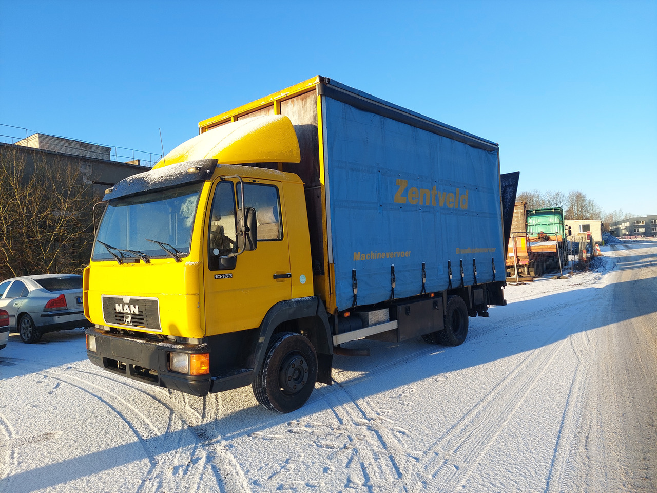 MAN - Camion à rideaux coulissants: photos 3 MAN - Camion à rideaux coulissants: photos 3