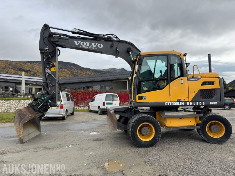 2012 Volvo EW140 D Hjulmaskin TILTROTATOR, 2 SKUFFER, SENTRALSMØRING - Pelle: photos 1 2012 Volvo EW140 D Hjulmaskin TILTROTATOR, 2 SKUFFER, SENTRALSMØRING - Pelle: photos 1