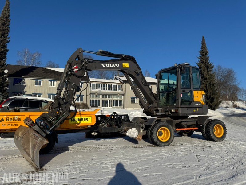 2022 Volvo EW60E HJULGRAVER MED HENGER, TILTROTATOR MED KLYPEKASETT, SKUFFER, SENTRALSMØRING - Pelle: photos 1 2022 Volvo EW60E HJULGRAVER MED HENGER, TILTROTATOR MED KLYPEKASETT, SKUFFER, SENTRALSMØRING - Pelle: photos 1