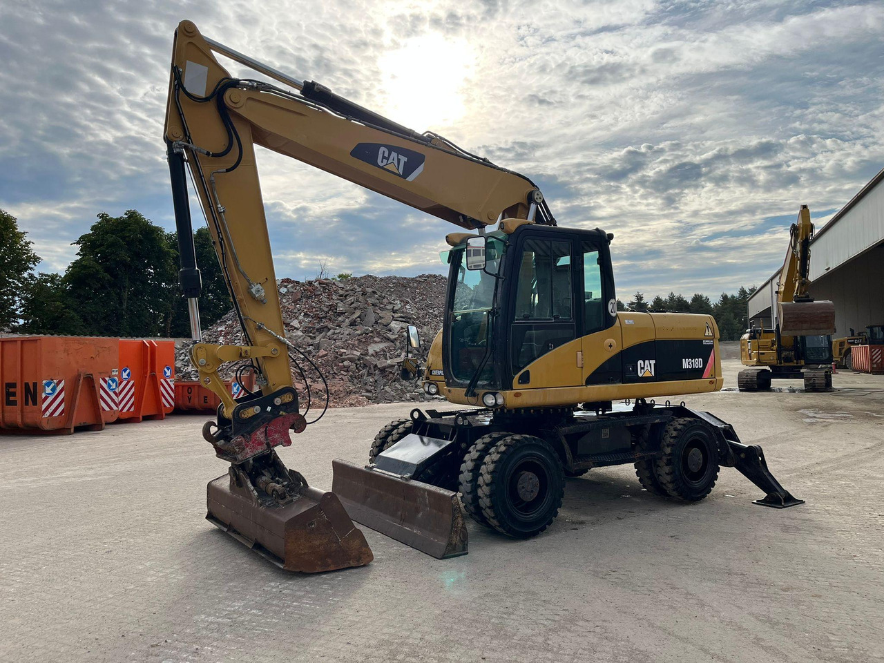 Caterpillar M318D - Pelle sur pneus: photos 5 Caterpillar M318D - Pelle sur pneus: photos 5