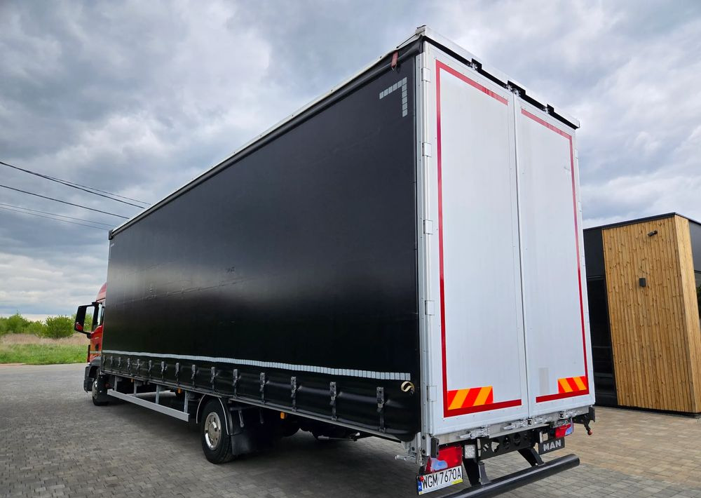 MAN TGL 12.250 - Camion à rideaux coulissants: photos 5 MAN TGL 12.250 - Camion à rideaux coulissants: photos 5