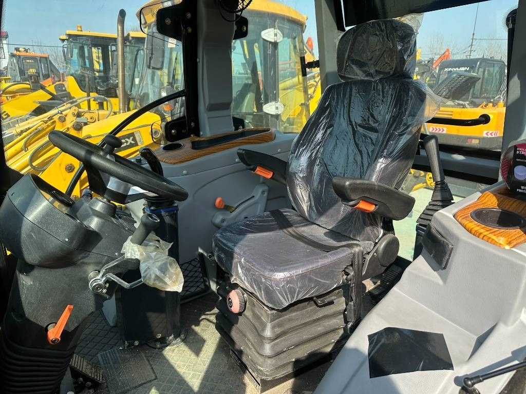 Tractopelle CAT 420 F ST: photos 16