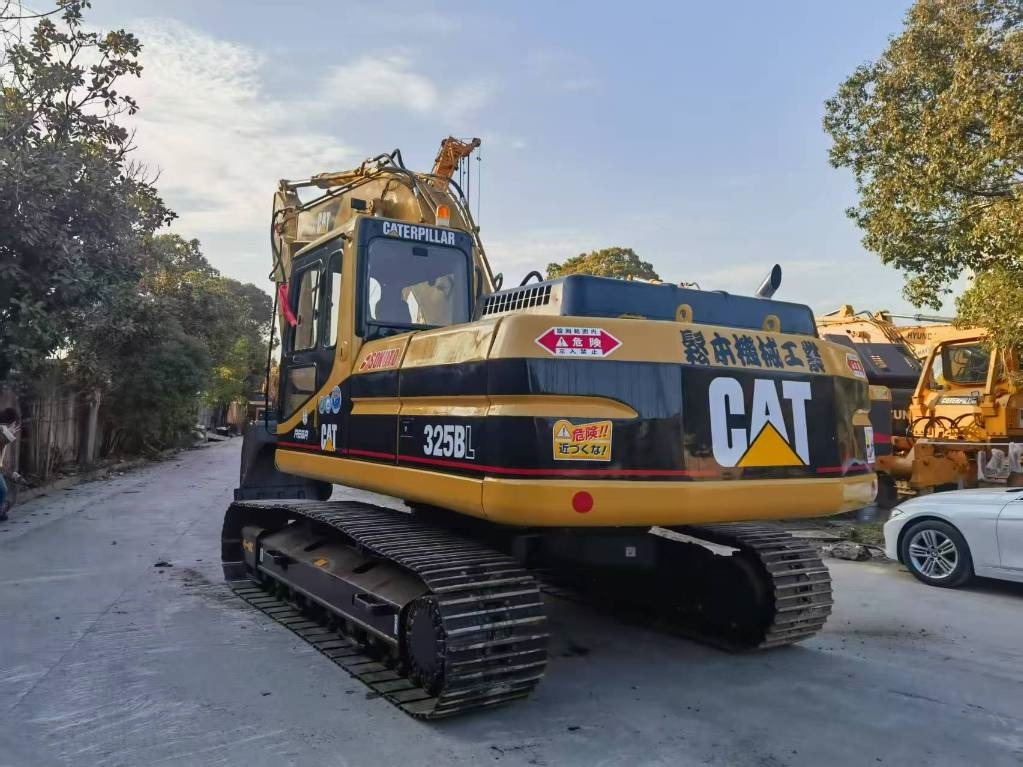 CAT CAT325B - Pelle de manutention: photos 1 CAT CAT325B - Pelle de manutention: photos 1