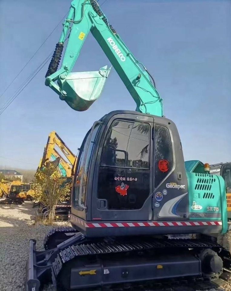 Pelle sur chenille Kobelco 75: photos 14