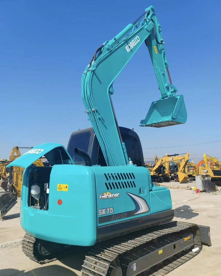 Pelle sur chenille Kobelco 75: photos 16