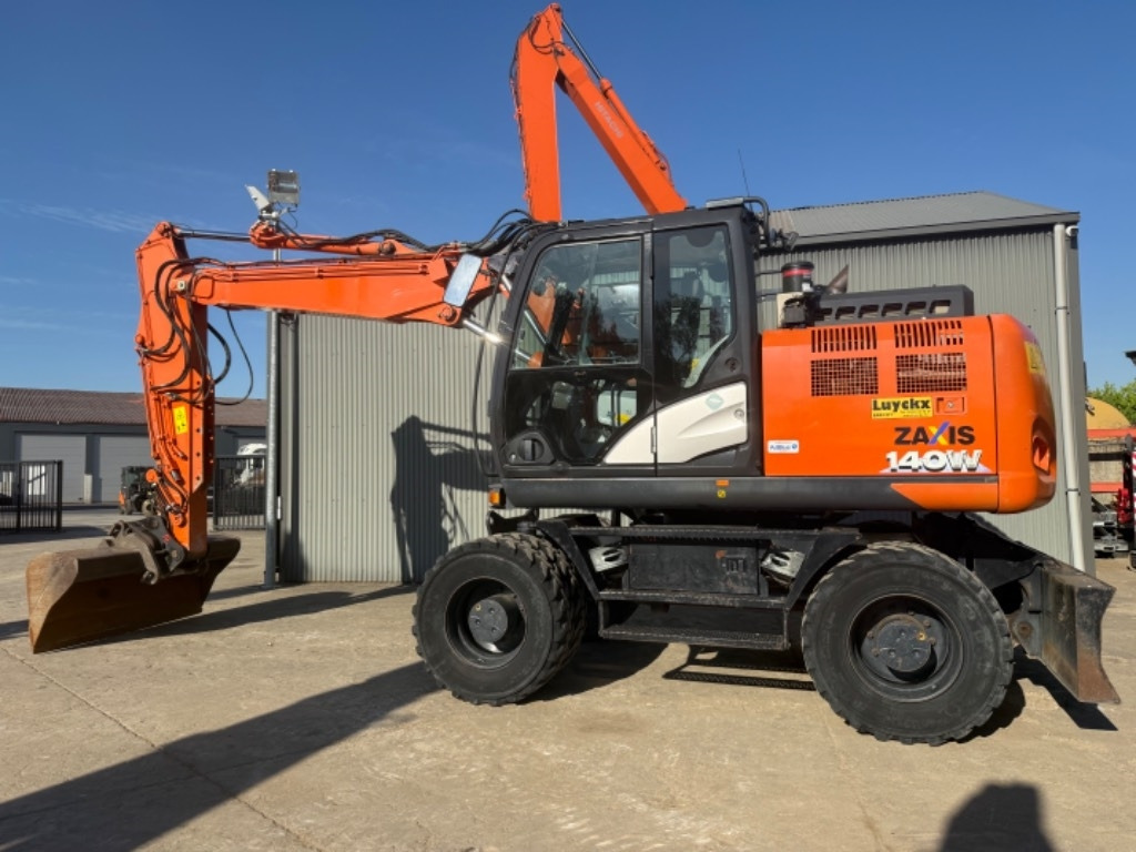 Hitachi ZX 140 WT-6 - Pelle sur pneus: photos 1 Hitachi ZX 140 WT-6 - Pelle sur pneus: photos 1