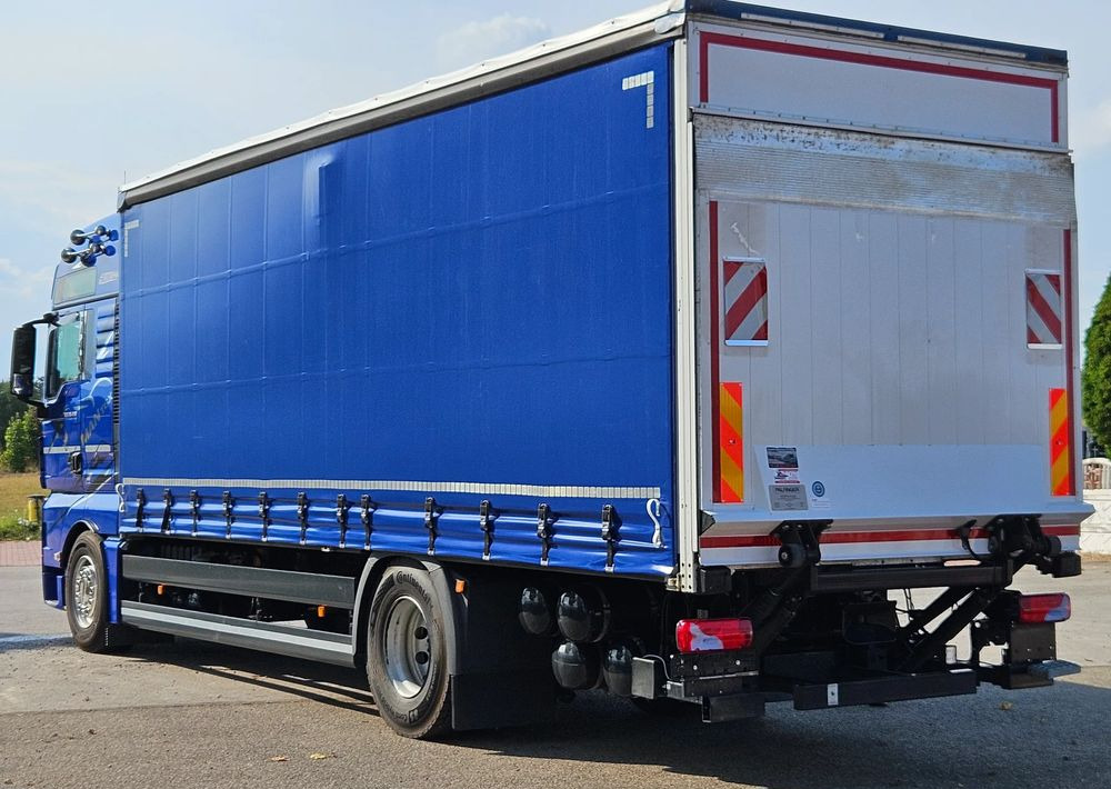 MAN TGX 18.430 / FIRANKA / WINDA / KLIMA POSTOJOWA / 300TYŚ PRZEBIEG / 2020 /E6 / KLIMA POSTOJOWA / SPROWADZONY / JAK NOWY / AUTOMAT - Camion à rideaux coulissants: photos 4 MAN TGX 18.430 / FIRANKA / WINDA / KLIMA POSTOJOWA / 300TYŚ PRZEBIEG / 2020 /E6 / KLIMA POSTOJOWA / SPROWADZONY / JAK NOWY / AUTOMAT - Camion à rideaux coulissants: photos 4