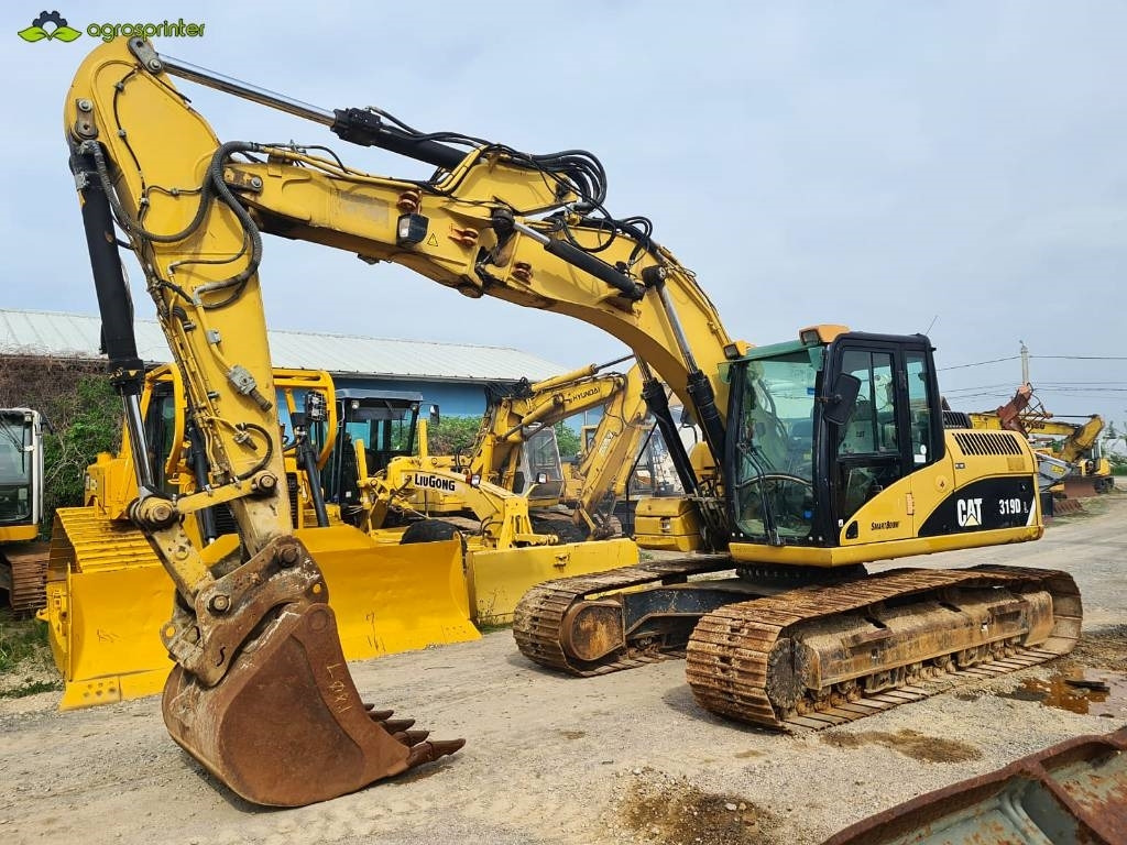 CAT 319 D L - Pelle sur chenille: photos 1 CAT 319 D L - Pelle sur chenille: photos 1