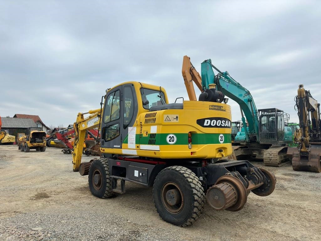 Doosan DX 160 WR - Pelle sur pneus: photos 2 Doosan DX 160 WR - Pelle sur pneus: photos 2