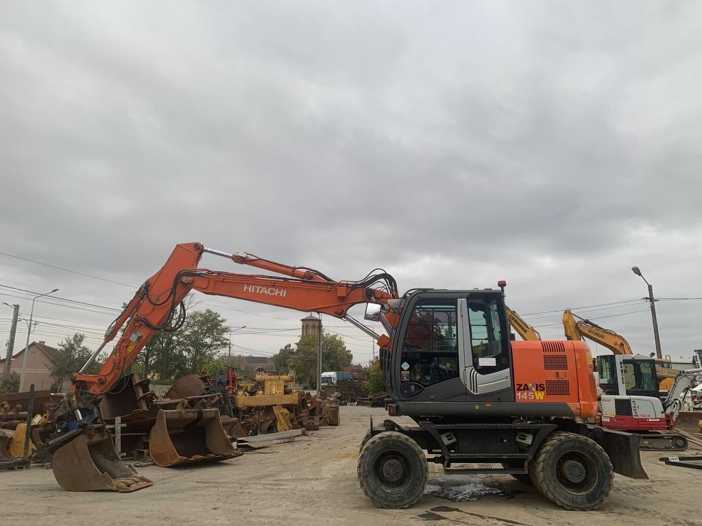 Hitachi ZX 145 W-3+SMP Rototilt  - Pelle sur pneus: photos 2 Hitachi ZX 145 W-3+SMP Rototilt  - Pelle sur pneus: photos 2