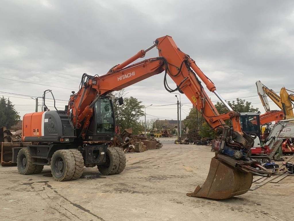 Hitachi ZX 145 W-3+SMP Rototilt  - Pelle sur pneus: photos 4 Hitachi ZX 145 W-3+SMP Rototilt  - Pelle sur pneus: photos 4