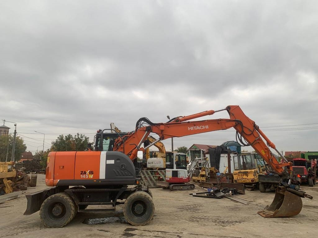 Hitachi ZX 145 W-3+SMP Rototilt  - Pelle sur pneus: photos 5 Hitachi ZX 145 W-3+SMP Rototilt  - Pelle sur pneus: photos 5