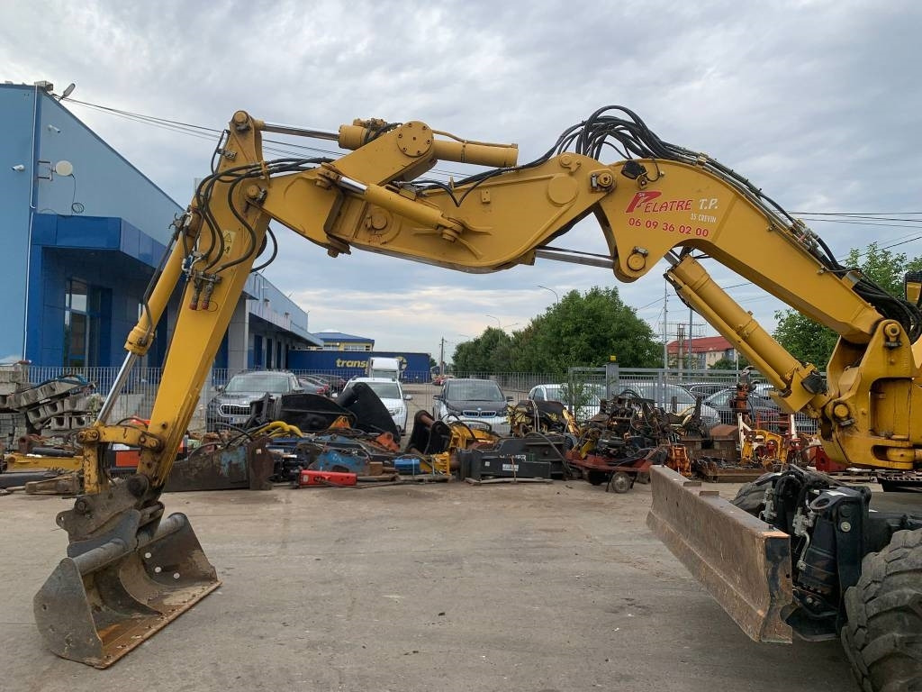 Komatsu PW118MR-11W - Pelle sur pneus: photos 3 Komatsu PW118MR-11W - Pelle sur pneus: photos 3